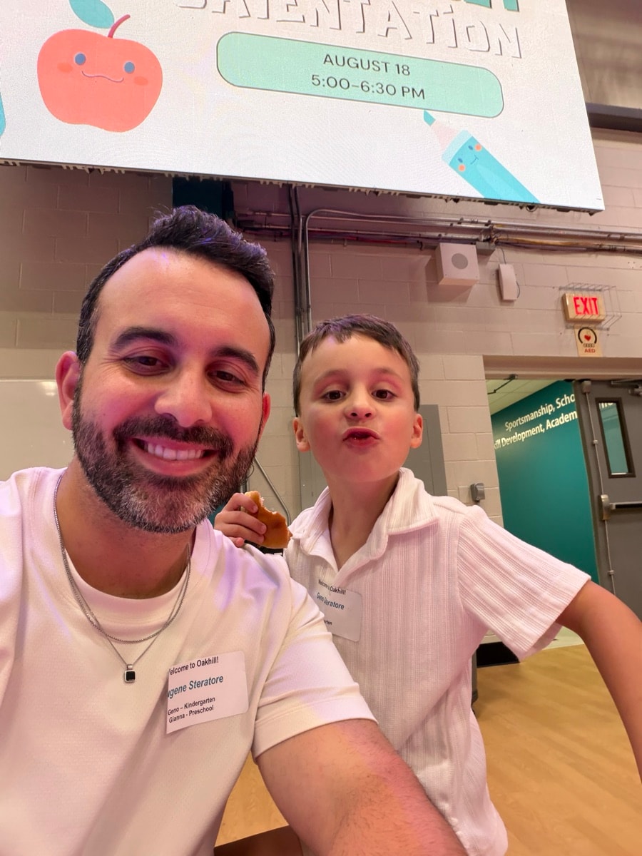 Gene and his son at school orientation